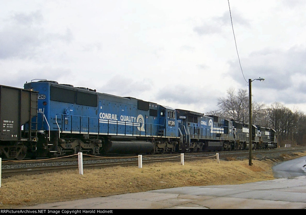 NS 6726 & 8207 in Conrail blue trail on an empty coal train